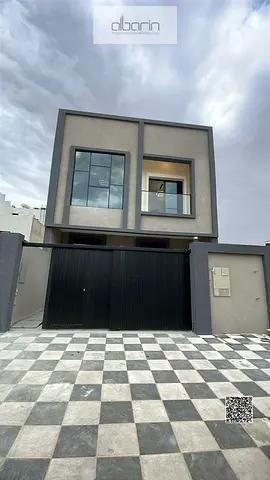 Villa for sale in Ajman: 5-bedroom townhouse (all master bedrooms) with a spacious living area.