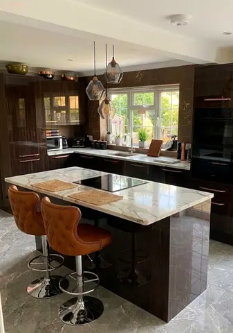 Modern kitchen island with marble top and 2 swivel bar stools