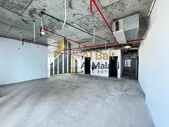 Office for Annual Rent in Al Majaz 2 | Open View | Free A/C | 2 Free Parking Spaces