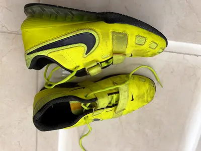 Nike yellow training/weightlifting shoes, used for a good amount, good condition