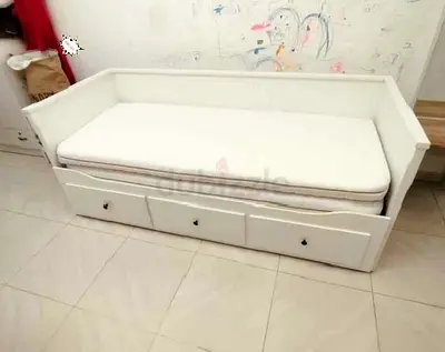 IKEA Hamnes Day bed with 3 storage drawers underneath and with 2 IKEA mattresses is available