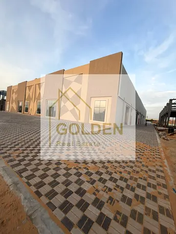 A prime warehouse for rent in the heart of a modern industrial area, strategically located in the Emirate of Umm Al Quwain. It features a high electrical capacity of 45 kva and direct street frontage.