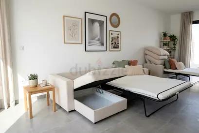 sofa bed with soft cushions, wide sleeping area, and large storage space under the