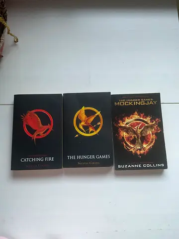 The Hunger Games trilogy - Catching Fire, Mockingjay, The Hunger Games (paperback)