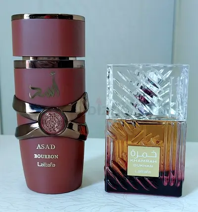 Two Lattafa Perfumes — Asad Bourbon Khamrah Dukhan