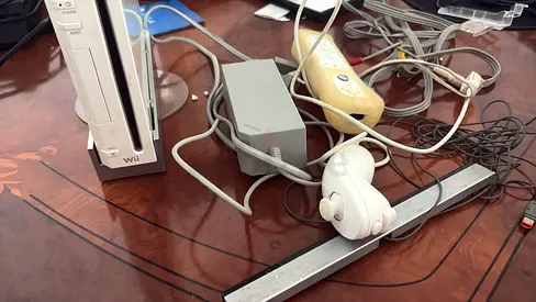 Nintendo Wii console with sensor bar, nunchuk, charger and accessories - used