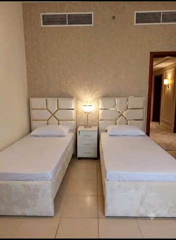 single upholstered bedwith headboards