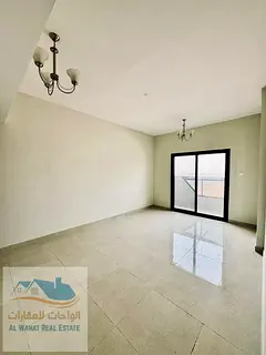 Two bedrooms, a living room, two bathrooms, and a balcony in Al Jurf 3, near the Sharjah and Dubai e