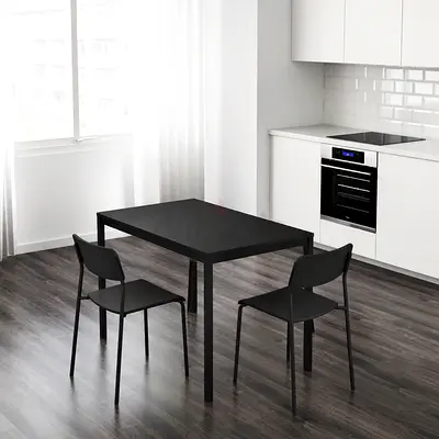 Simple black dining table + two chairs, metal legs