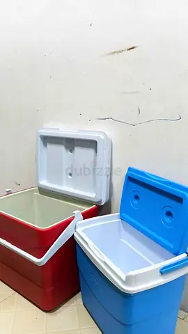 Set of two portable coolers / ice chests - red and blue