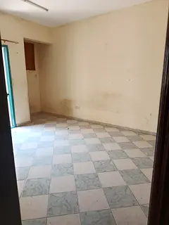 Official sharing apartment for bachelors in Umm Al Tarafa. Two bedrooms, hall, two bathrooms, balcon