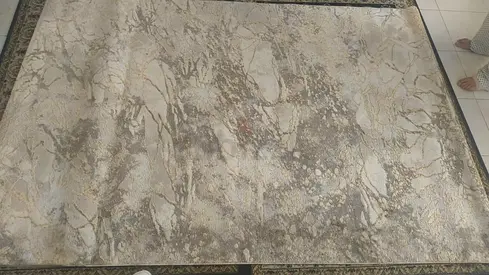 Light grey abstract area rug - good condition