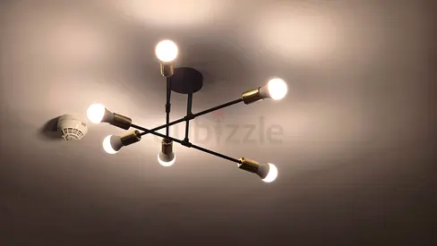 Black-and-brass six-light ceiling fixture