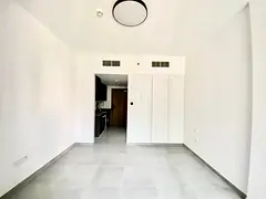 Luxury studio apartment with balcony Waldrop cover parking gym pool kids play AERA