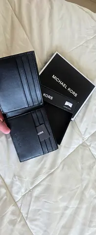 Genuine Michael Kors black leather bifold mens wallet - like new