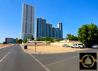 ارض سكني فلل زاويه شارعين علي شارع اسفلت خلف ابراج الكورنيش بموقع مميز وتملك حر