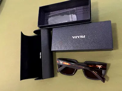 Prada womens tortoiseshell sunglasses with original case and box