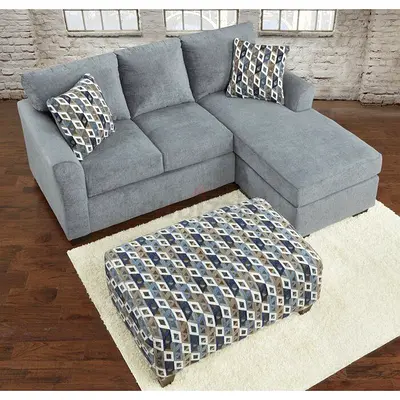 Light grey L-shaped sectional sofa with ottoman