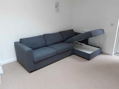 Grey 3-seater L-shaped Sofa bed with Storage - Good Condition