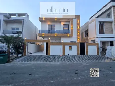 For sale in Al Yasmeen, Ajman: a five-bedroom villa featuring a separate majlis and a living room.