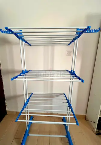 Three-tier foldable clothes drying rack - sturdy and compact