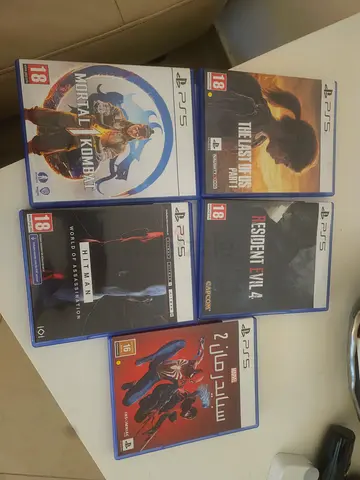 Bundle of 5 PS5 Games: The Last of Us Part I, Resident Evil 4, Mortal Kombat, Hitman, Spider-Man 2