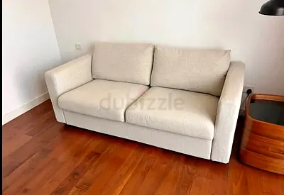 Beige 2-Seater Sofa bed in Good Condition