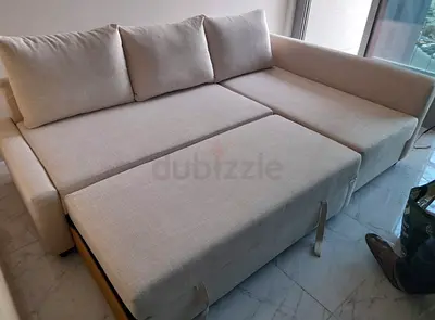 Comfortable Cream L-Shaped Sofa Bed with Pull-Out Extension