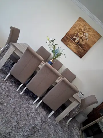 8-seater dining table set with upholstered chairs and rug - light wood finish