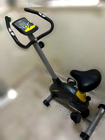 Used upright exercise bike with digital monitor - good working condition