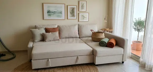 Multi-functional L-shape sofa bed combining comfortable seating, a spacious sleeping area, and usefu