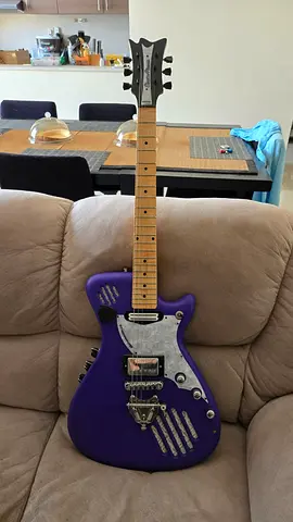 Very unique electric guitar with analog effects and speakers onboard