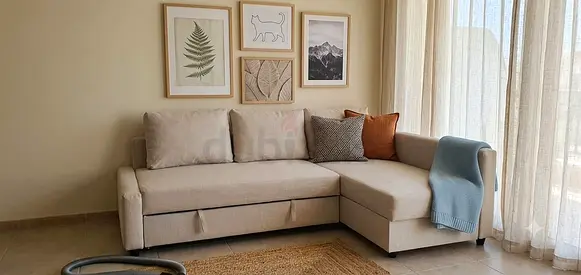 Elegant fabric corner sofa bed designed for everyday comfort, with a large sleeping surface and gene