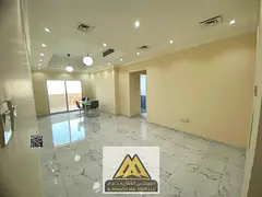 2BR apartment for sale in Emirates City, 1605 sq.ft., 2 baths, open view, parking included, AED 450K