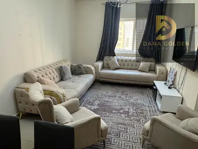 Furnished three-bedroom apartment with two living rooms and three bathrooms for monthly rent in Sharjah, Al Taawun area, with internet access.