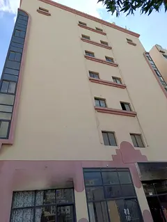 Investment building for sale in Al Bu Tina, Sharjah. G+6 with 8 shops and 48 residential units. Annu