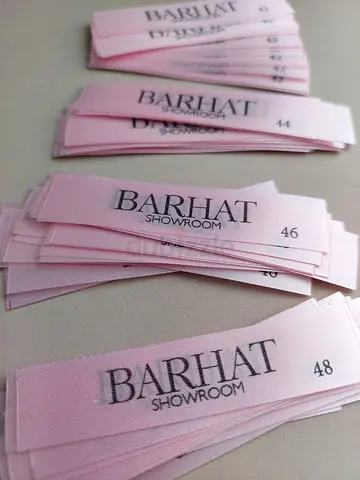 Lot of branded pink clothing size labels (Barhat Showroom) - new