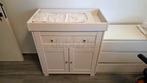 White wooden changing table Home Center  with drawers and changing pad from Mamas and papas