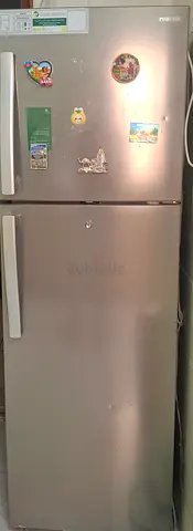 Silver Double-Door Refrigerator - Good Working Condition