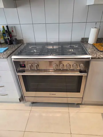 Stainless Steel Gas Range with Oven - Good Working Condition