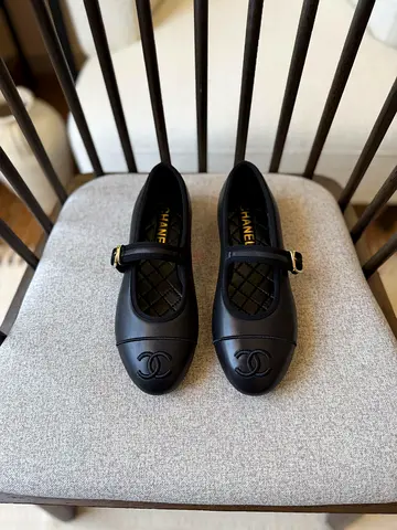 Chanel black lambskin flats