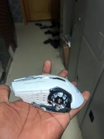 Portable electronic gadget - small white handheld device (used)