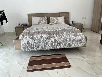 King-size wooden bed frame with nightstands — modern oak finish-800