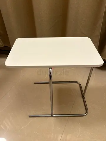 Small white side table with chrome legs - good condition