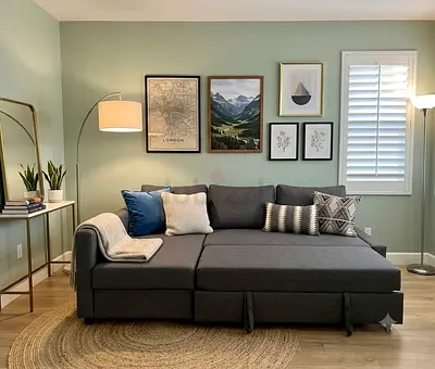 Modern Sofa Bed Design: A stylish and practical sofa that easily converts into a comfortable bed. Ov