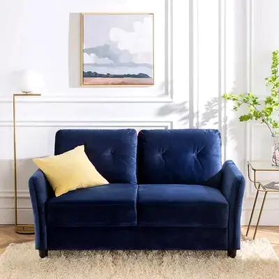 Rich navy blue velvet upholstered loveseat