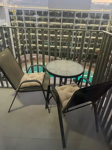Outdoor balcony bistro set - glass top table with two cushioned chairs