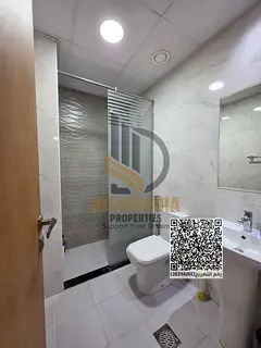Apartment for Rent in Gulf Tower, Emirates City. Two Bedrooms and Living Room with Private Parking.