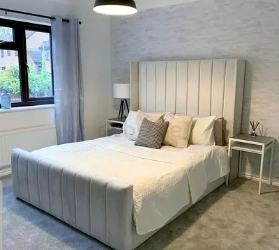 Modern Upholstered Bed Frame with High Vertical Channel Headboard