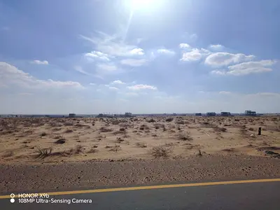 **Prime Commercial & Industrial Plot for Sale | Directly on Maliha Road | Ideal for Showrooms, Offices & Storage**